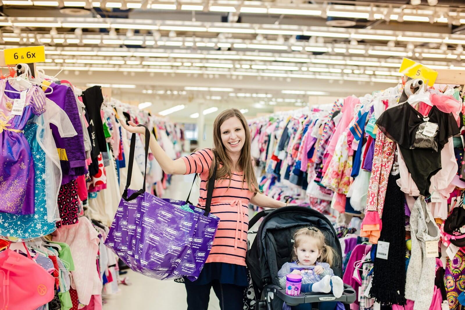 A mom shows shopping haul with daughter in stroller. 