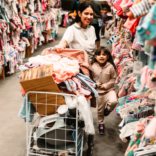 Mom and daughter shop the JBF event. 